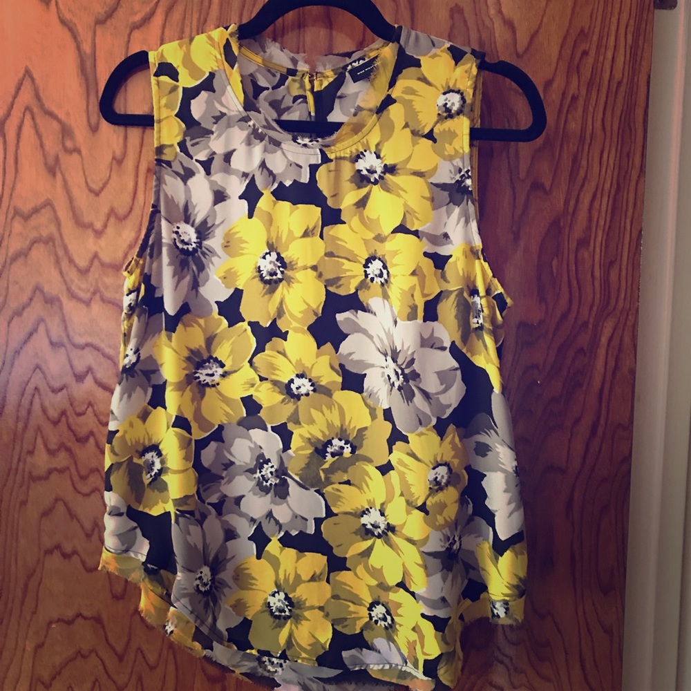 Sheer floral sleeveless blouse